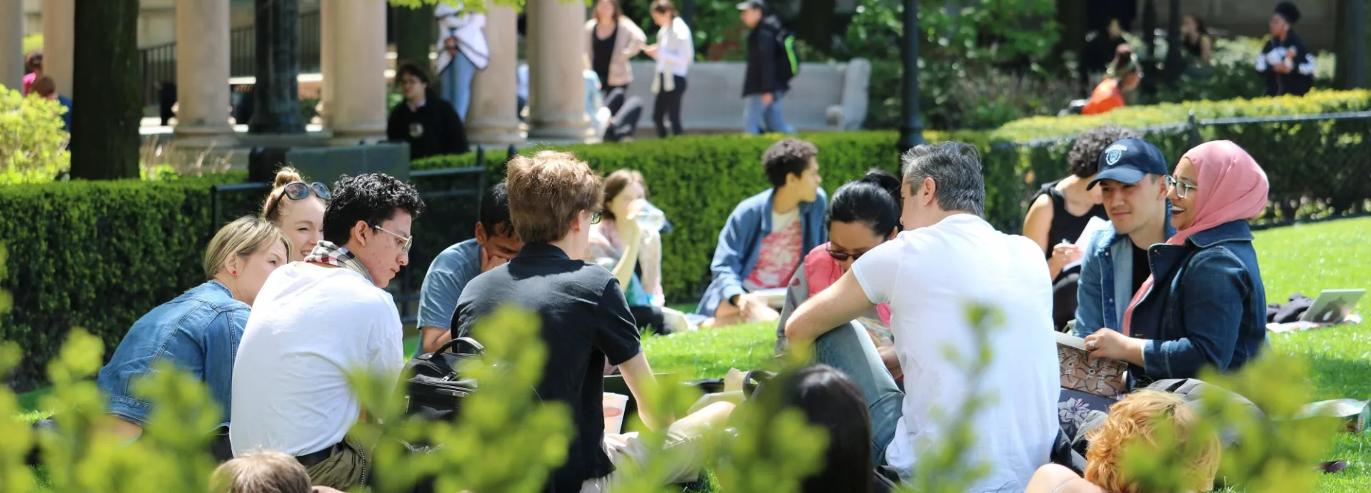 Small class discussions outside on the lawn